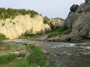 Guide boats parked on the shore line of the Smith River