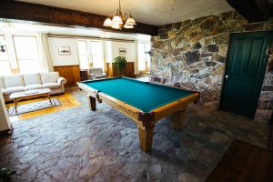 Pool table in the lodge at Healing Waters Lodge